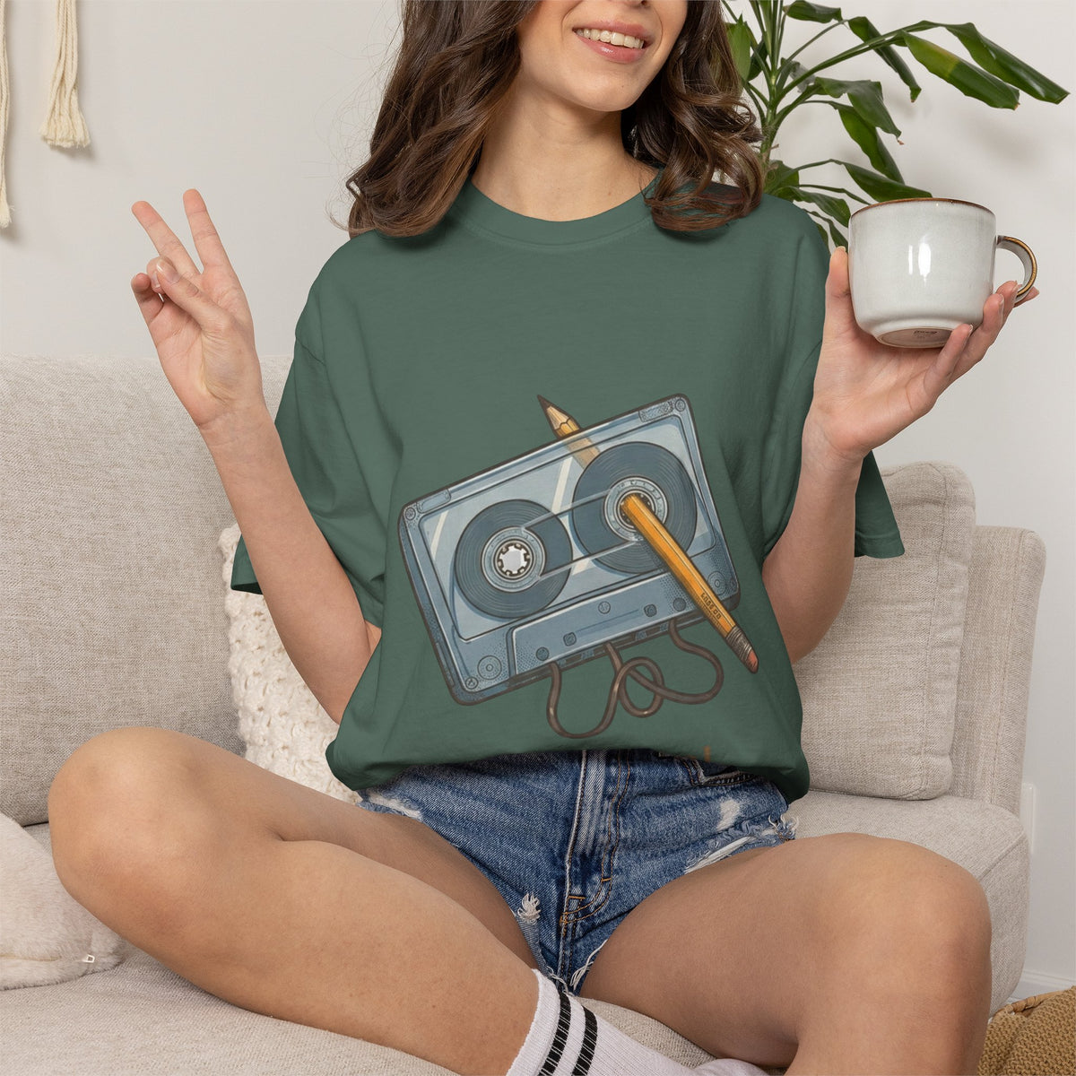 The Original "Rewind" Button Cassette Tee in Dark Green